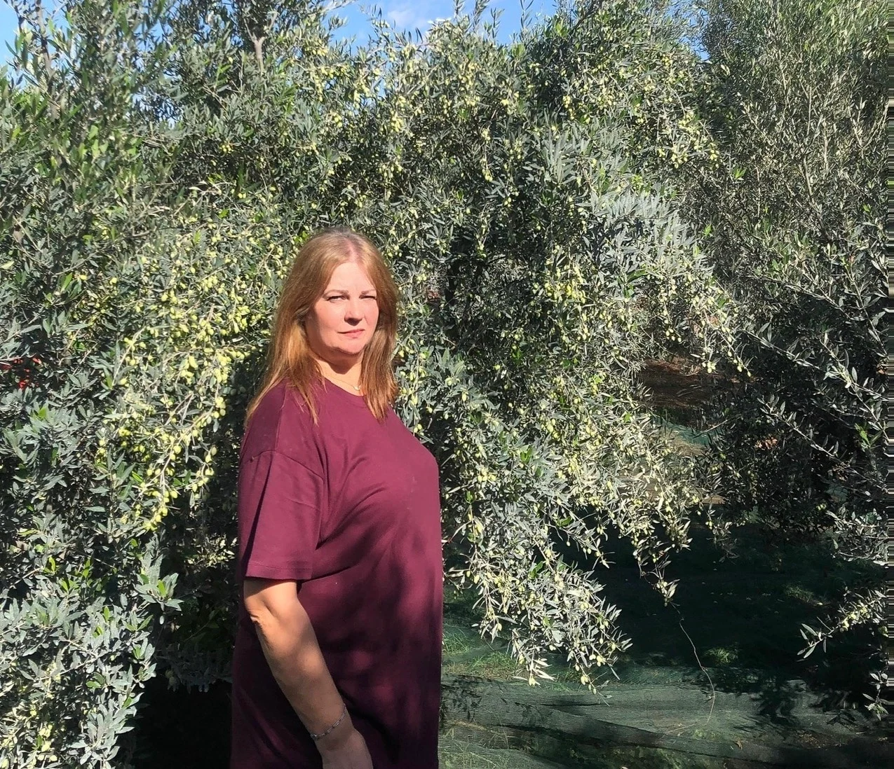 Maria Martinaki in her olive grove