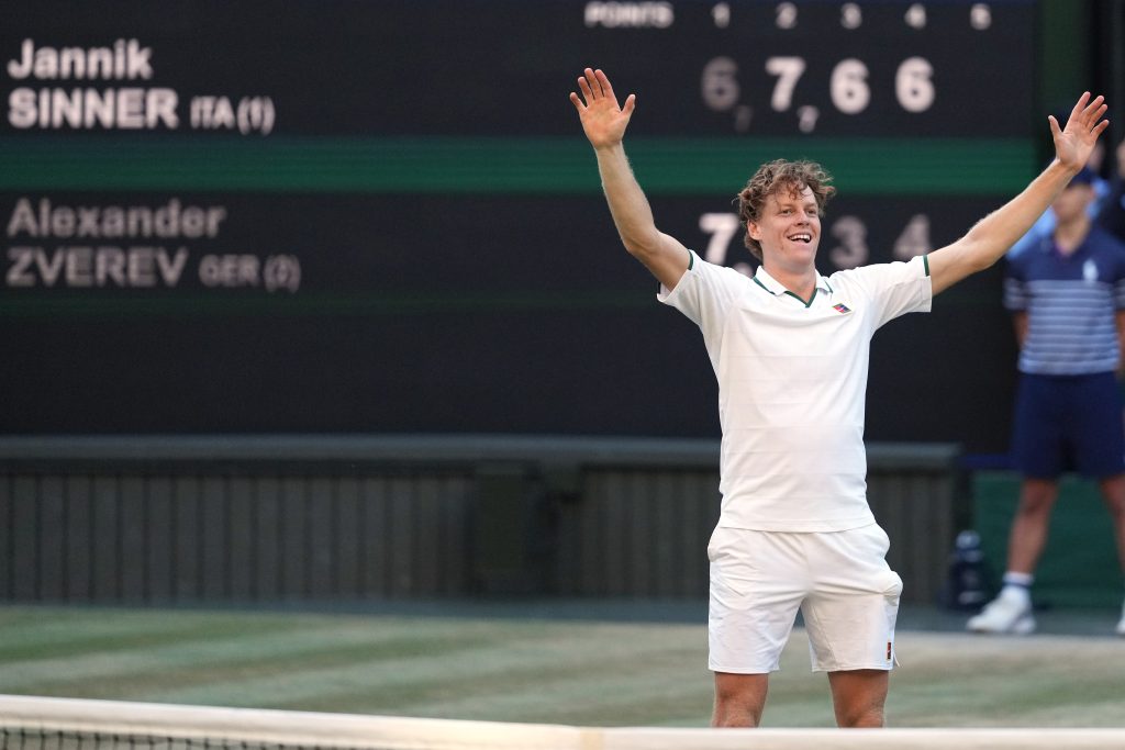 Jannik Sinner of Italy reacts to winning against Alexander Zverev of Germany in the men's singles final at Wimbledon Tennis Championships in London, Sunday, July 12, 2026. (AP Photo/Kirsty Wigglesworth)
