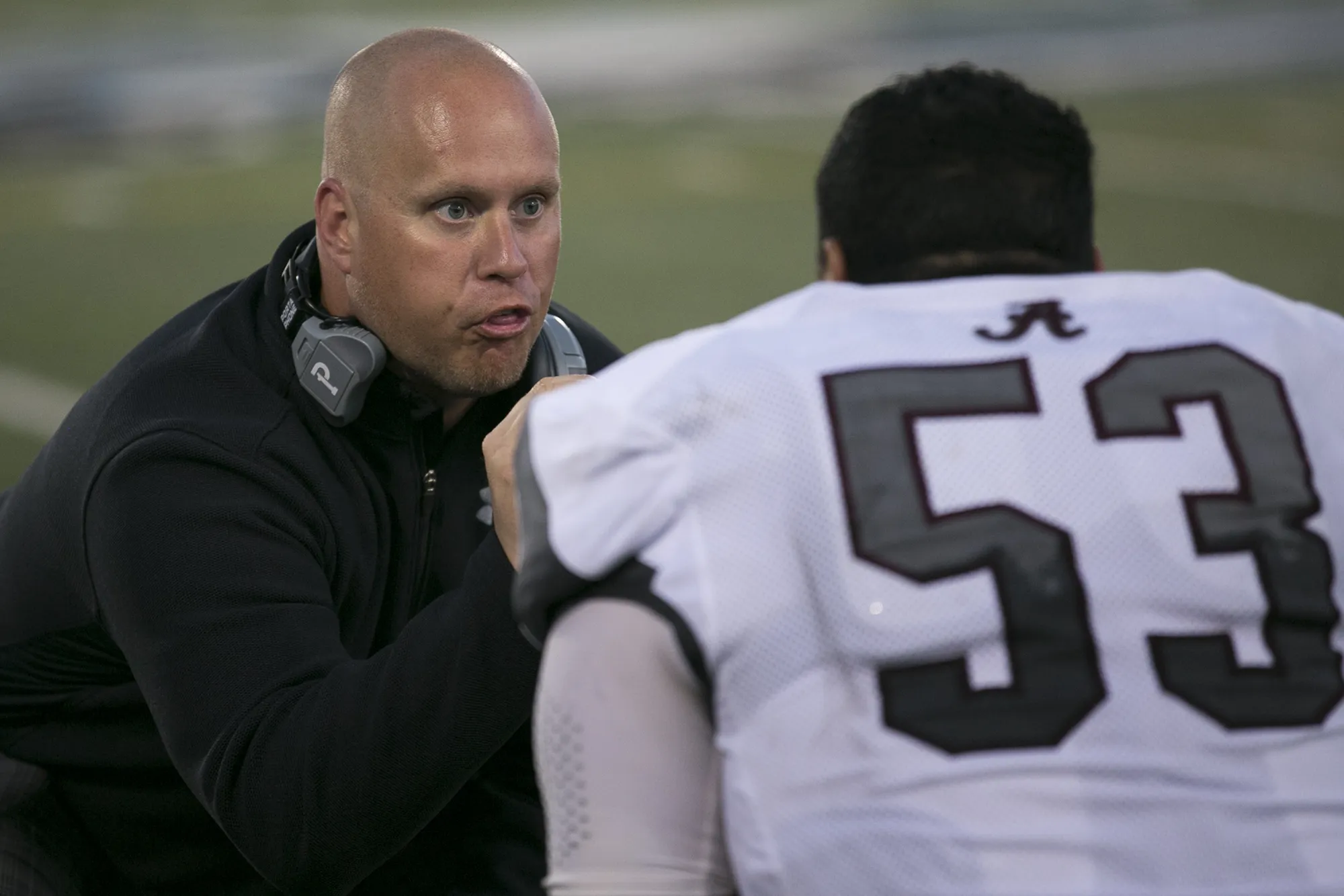 Greece Arcadia assistant coach Nate Zelesnikar has words for Nick Santiago during a game at Eastridge High School on Friday, Sept. 2, 2016.