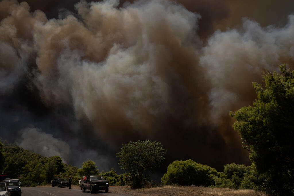 More than 400 firefighters were battling blazes in the area of Porto Germeno on the Gulf of Corinth