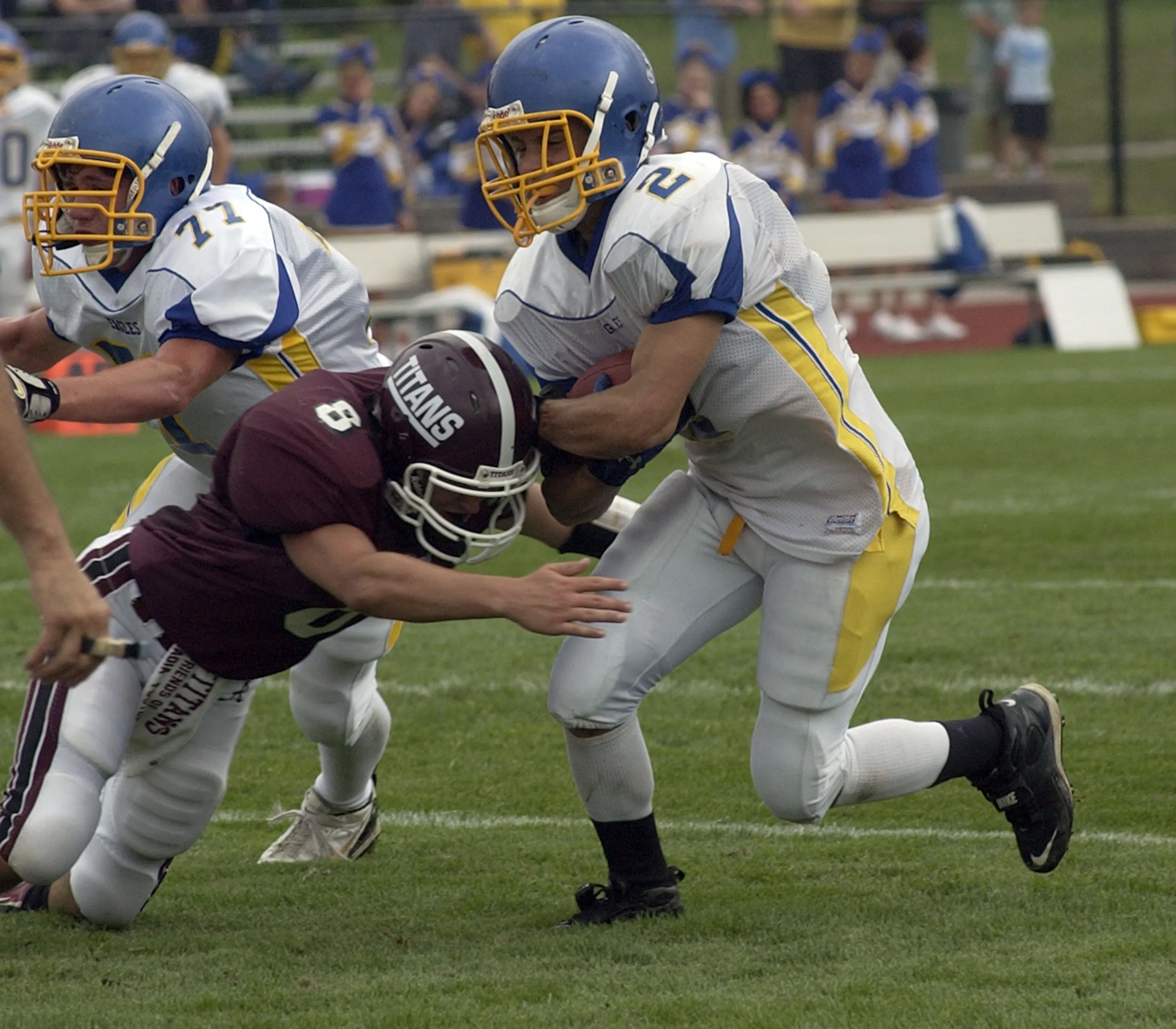 Greece Arcadia's Alex O'Brien (8), left, hits Irondequoit RB Jake Scott (2) during a game on Sept. 13, 2008.