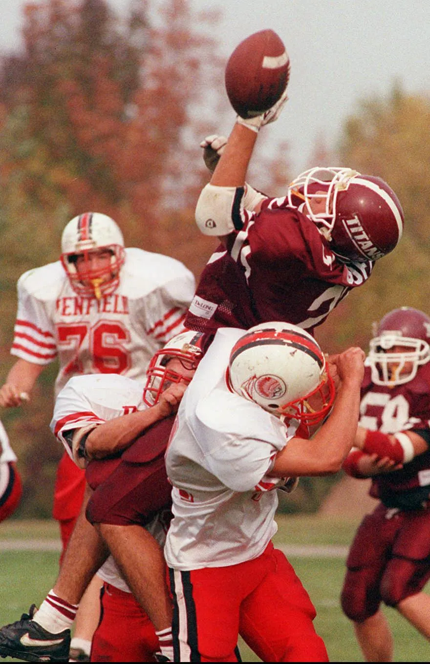 Greece Arcadia's Jeff Goff tries to catch a pass that was eventually intercepted in a 1994 game against Penfield.