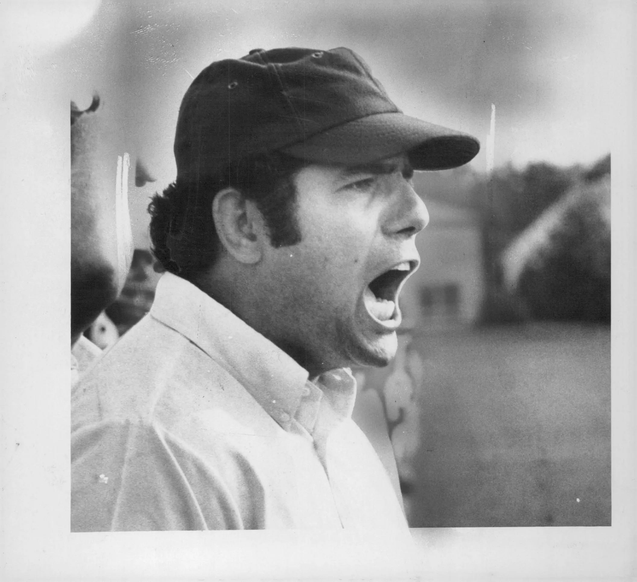 Greece Arcadia football coach Mike Lopa barks out instructions to his team.