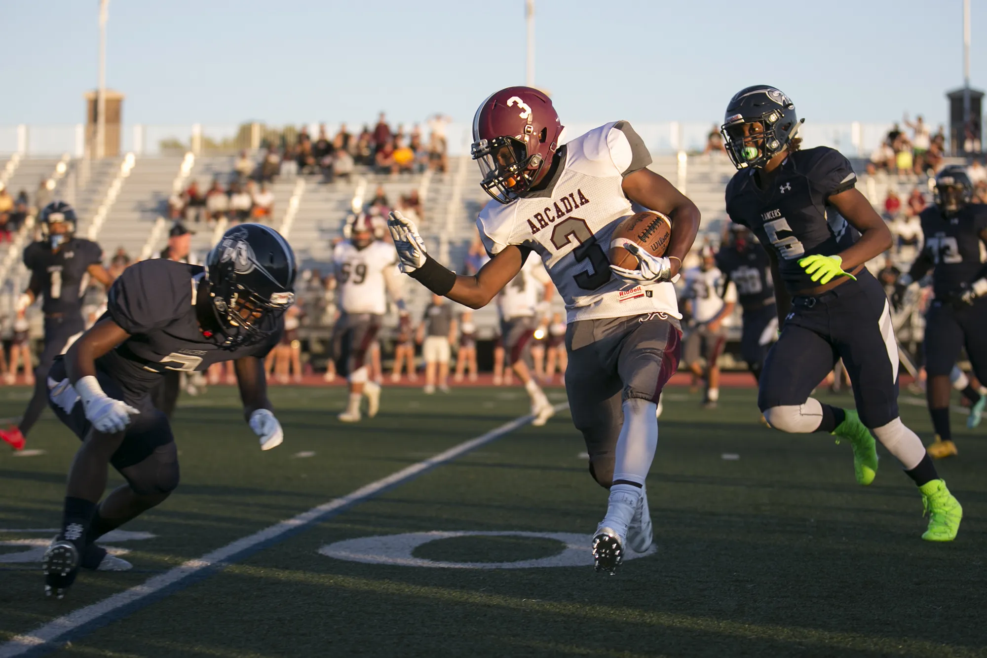 Greece Arcadia's Robert Smith rushes during a game at Eastridge High School on Friday, Sep. 2, 2016.