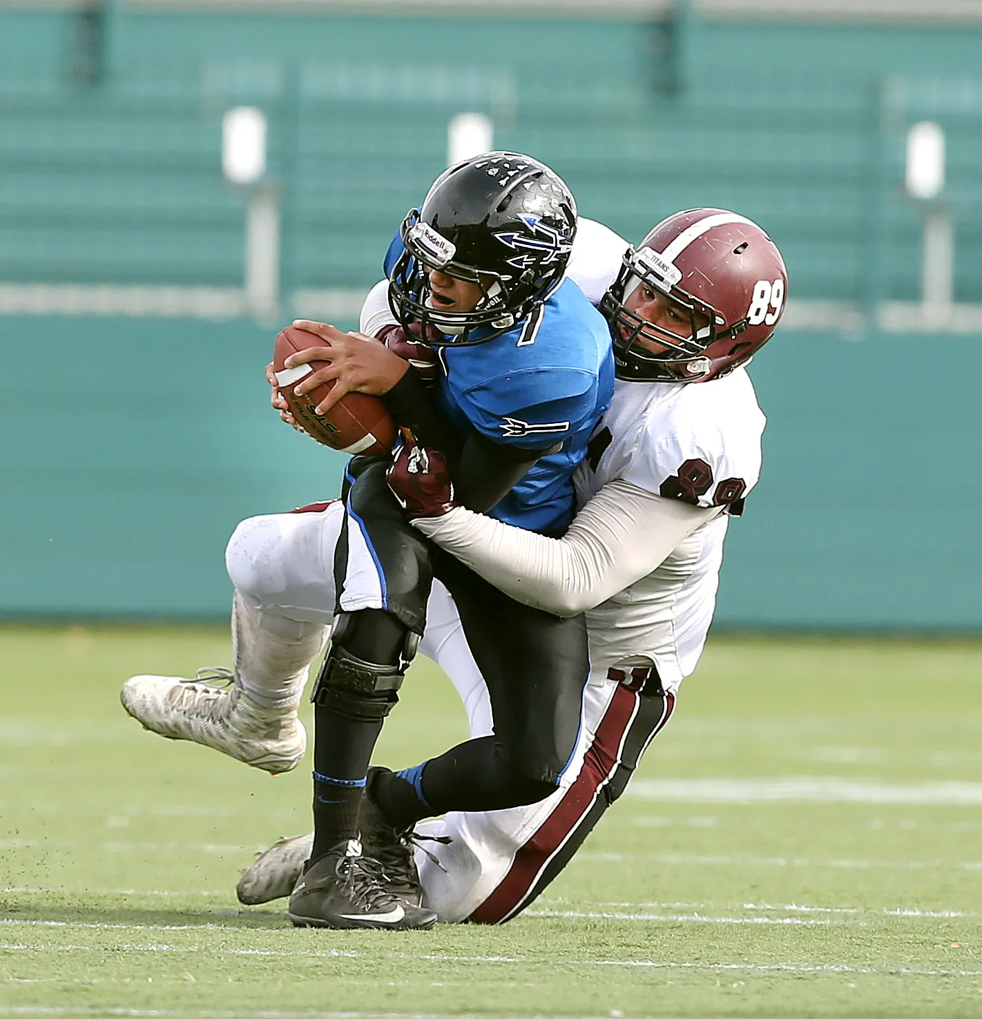 Arcadia defensive lineman Anthony Finucane sacks Brockport's Ashton Scott during a game played in 2015.