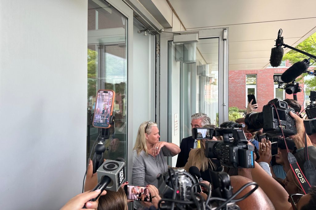 Dawn Light questioned by reporters